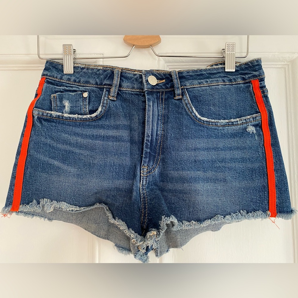 Zara cut off denim shorts with red stripe down the side.